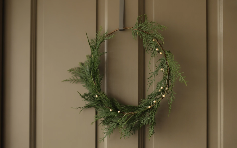Minimal Greenery Wreaths on a Neutral Door