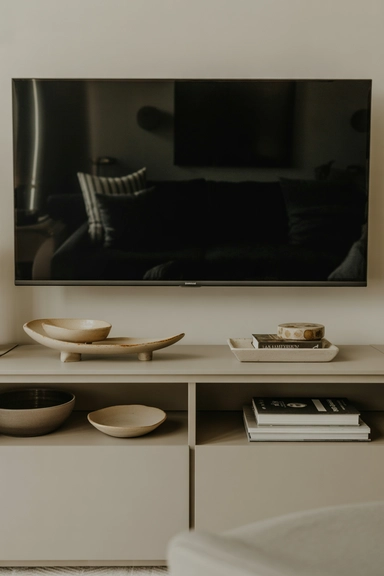 Keep the Living Room TV Stand Decor Lower Than the Screen