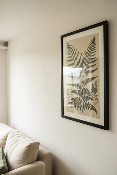 Wall Decor Chosen for Scale Over Quantity