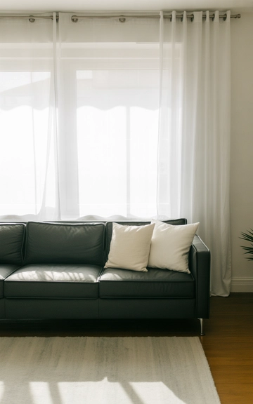 Crisp white details to brighten the grey couch