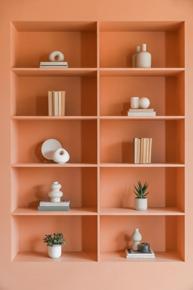 Orange Built-In Shelving That Adds Depth Without Clutter