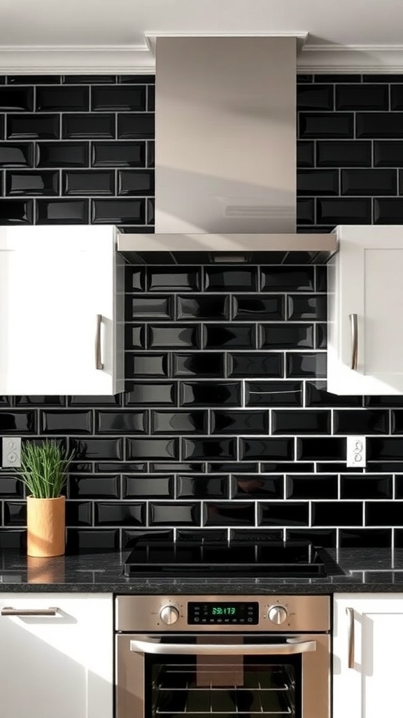 A modern kitchen featuring black glass subway tiles as a backsplash, with white cabinets and a black countertop.